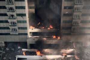 High-rise building engulfed in fire